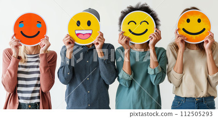 Healthy workplace culture concept. A group of diverse people holding happy emoticons. Teamwork Healthy workplace culture concept. A group of diverse people holding happy emoticons. Teamwork 112505293