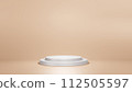 A white podium with steps sits on a white background, resembling a circle. It stands out against the clean aesthetic, like liquid on dishware 112505597