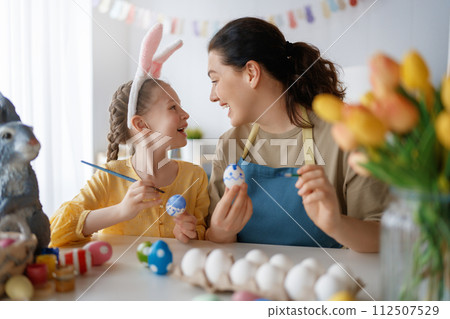 family preparing for Easter 112507529