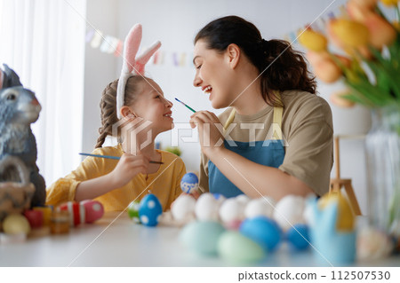 family preparing for Easter family preparing for Easter 112507530