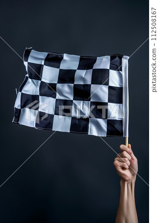Checkered flag in hand. Racing, the concept of start, finish 112508167