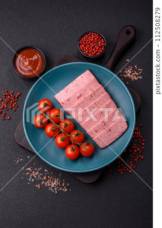 Delicious canned pink ham with salt, spices and herbs 112508279