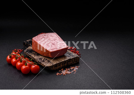 Delicious canned pink ham with salt, spices and herbs 112508360