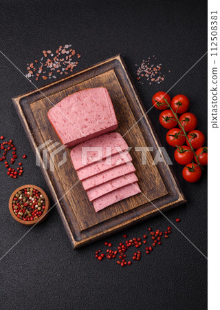 Delicious canned pink ham with salt, spices and herbs 112508381
