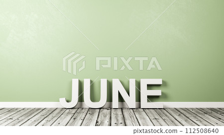 June Text on Wooden Floor Against Wall June Text on Wooden Floor Against Wall 112508640