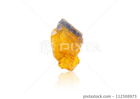 Macro mineral stone Fluorite yellow and blue color on a white background 112508973
