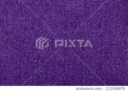 purple color jeans texture, factory fabric on white background purple color jeans texture, factory fabric on white background 112508976