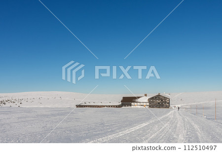 Meadow Hut , ski lodge,  krkonose mountains Czech Republic. Winter sunny day. 112510497