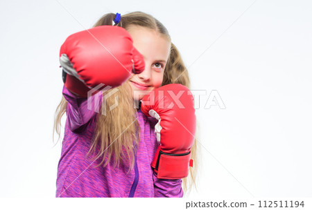 little girl in boxing gloves punching. knockout and energy. Sport success. little girl in boxing gloves punching. knockout and energy. Sport success. 112511194