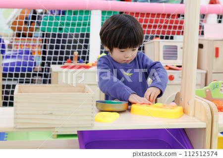 boy playing house boy playing house 112512574