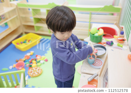 boy playing house boy playing house 112512578