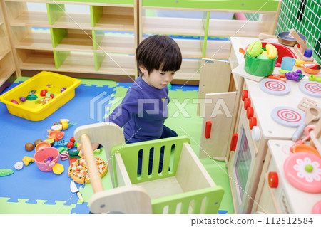 boy playing house boy playing house 112512584