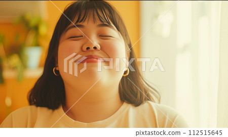 Young and fat woman with a happy smile 112515645