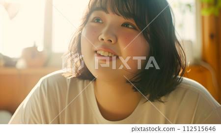 Young and fat woman with a happy smile 112515646