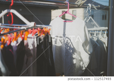 Households drying laundry on the balcony Households drying laundry on the balcony 112517493