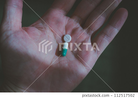 Taking medicine 112517502