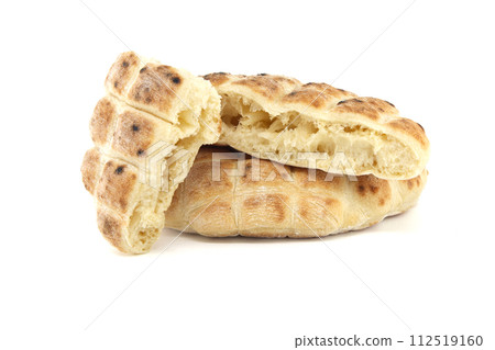 Round pita flat-bread on a white background Round pita flat-bread on a white background 112519160