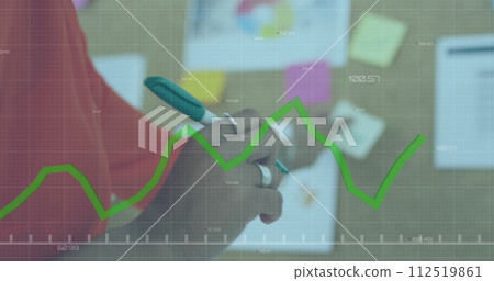 Image of digital interface showing statistics with woman in office writing on a sticker Image of digital interface showing statistics with woman in office writing on a sticker 112519861