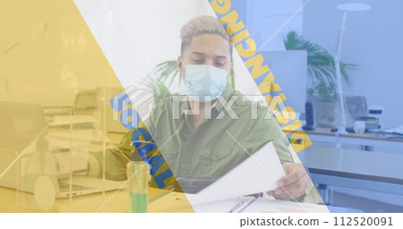 Image of words social distancing with man working in office Image of words social distancing with man working in office 112520091
