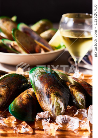 New Zealand green muscle on a white board New Zealand green muscle on a white board 112520410
