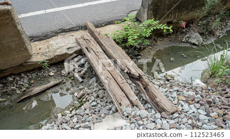 the destroyed bridge across the river 112523465