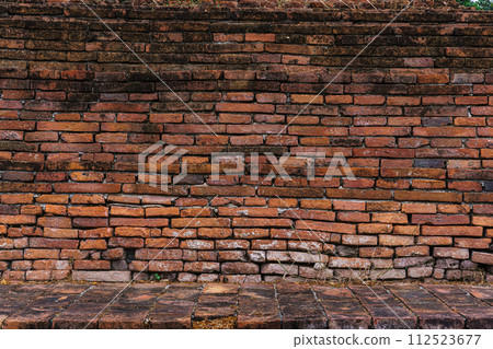 Old Abstract Brick Wall Large Orange Brick Wall Background Texture ancient buddhist temple in Thailand for pattern Background With Copy Space For design Old Abstract Brick Wall Large Orange Brick Wall Background Texture ancient buddhist temple in Thailand for pattern Background With Copy Space For design 112523677