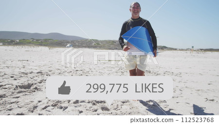 Image of speech bubble with thumbs up icon and numbers over man running with surfboard on beach 112523768
