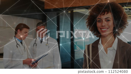 Image of network of connections over diverse doctors 112524080