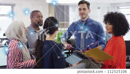 Image of connections and data processing over diverse business people in office Image of connections and data processing over diverse business people in office 112525106