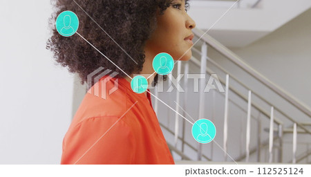 Image of networks and data processing over african american businesswoman in office Image of networks and data processing over african american businesswoman in office 112525124