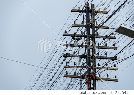 Old style Telegraph poles along Many types Telecommunication cable the railway communication system pillar Thailand 112525493