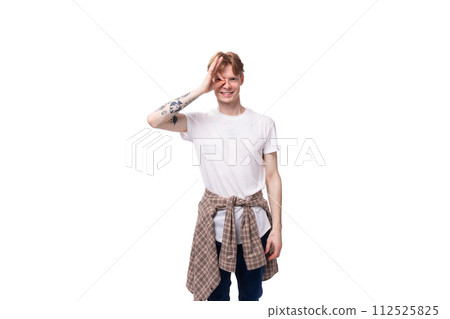 young cheerful positive european male student with golden red hair wearing glasses on white 112525825