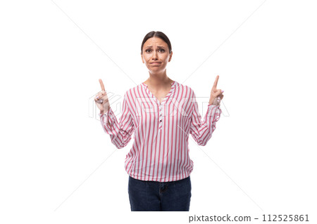 young slender well-groomed brunette leader woman with a ponytail hairstyle dressed in a striped 112525861