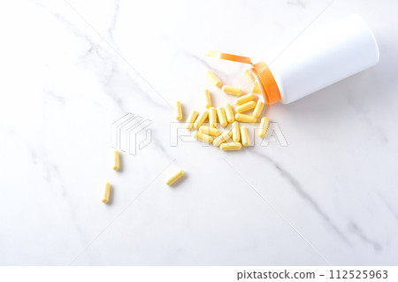 Improve your health by taking capsule supplements Improve your health by taking capsule supplements 112525963