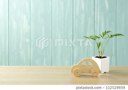 blue wall and table palm and wooden toys 112529939