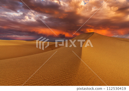 Sunset over the sand dunes in the desert. Rub' al Khali desert 112530419