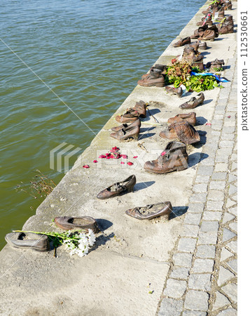 Iron Shoes memorial to 2WW Jewish Holocaust victims symbolizing the massacre of people shot Iron Shoes memorial to 2WW Jewish Holocaust victims symbolizing the massacre of people shot 112530661