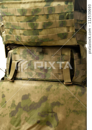 Soldier wearing military uniform close up photo Soldier wearing military uniform close up photo 112530693