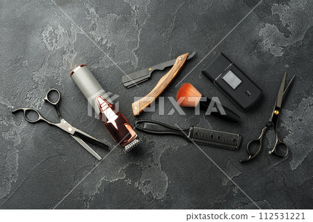 Set of tools for hairdressing and barbershop on gray background 112531221