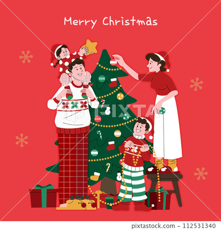 The family is decorating the tree 112531340