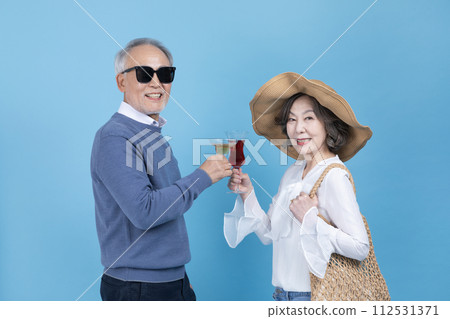 A senior holding a wine glass A senior holding a wine glass 112531371