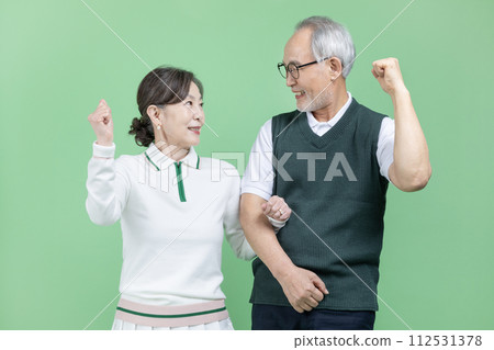 A senior wear a golf suit A senior wear a golf suit 112531378
