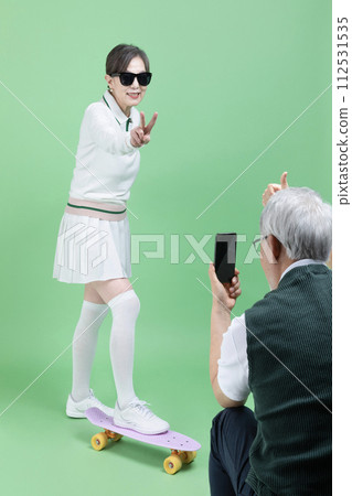 A senior wear a golf suit A senior wear a golf suit 112531535