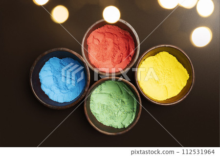 Closeup view of colorful Holi powder on the bowl Closeup view of colorful Holi powder on the bowl 112531964