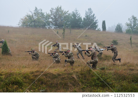 A disciplined and specialized military unit, donned in camouflage, strategically patrolling and maintaining control in a high-stakes environment, showcasing their precision, unity, and readiness for 112532553