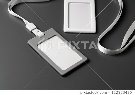 Blank badges on gray background copy space 112533450