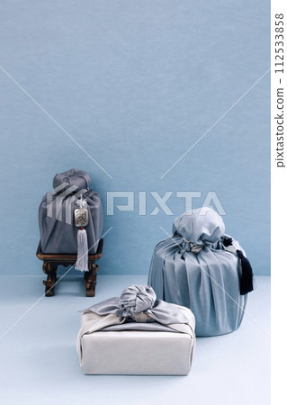 Several pieces of gift cloth are placed under the refreshments table Several pieces of gift cloth are placed under the refreshments table 112533858