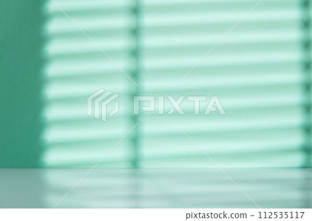 Mint blue wall with shadows for background Mint blue wall with shadows for background 112535117