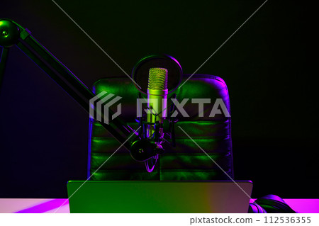 Home studio podcast interior. Microphone, table and chair 112536355