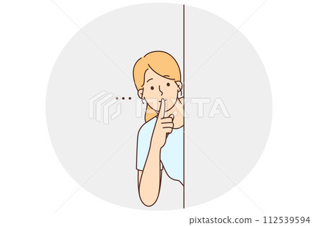 Young woman show hush hand gesture 112539594